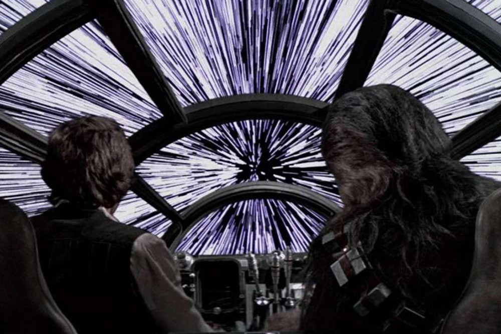 Han Solo et Chewbacca pilotant le Faucon Millenium